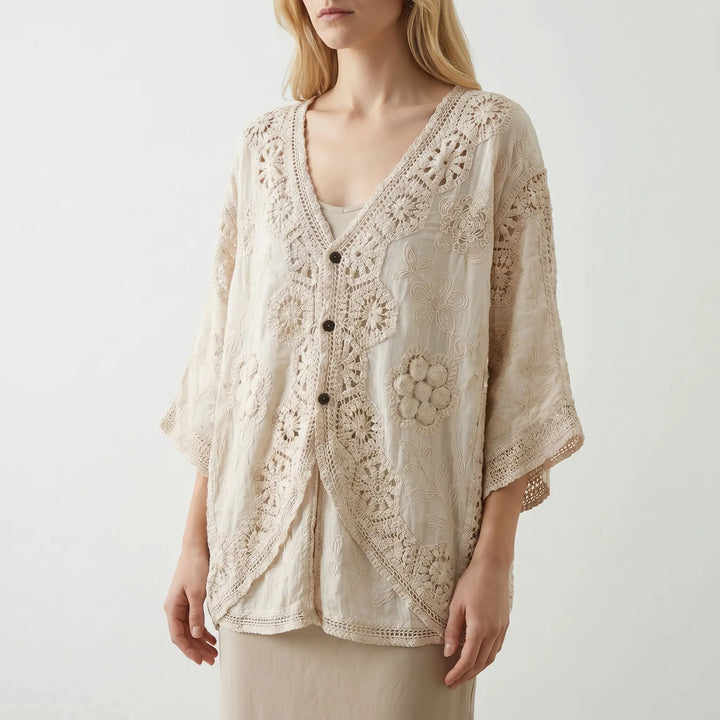 Stylish women's lightweight bohemian top, cream color, perfect as a summer cardigan, beach cover-up, or vacation wear.
