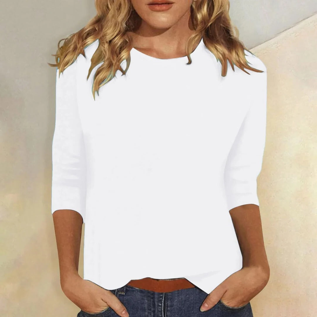 Comfortable women's relaxed fit 3/4 sleeve crew neck top, ideal for layering.