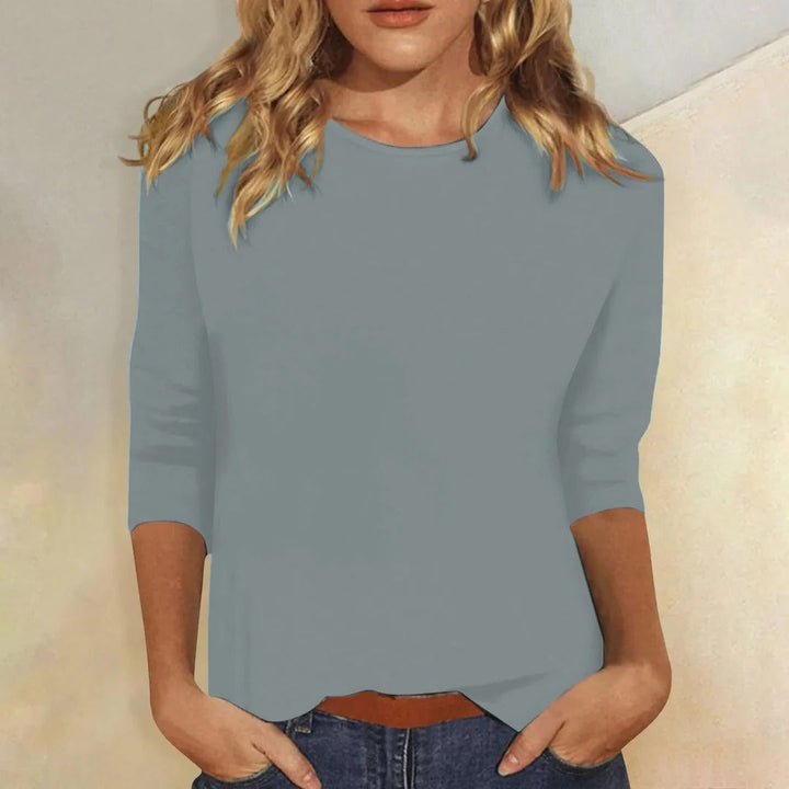 Soft women's 3/4 sleeve relaxed fit top, perfect for casual all-season comfort.