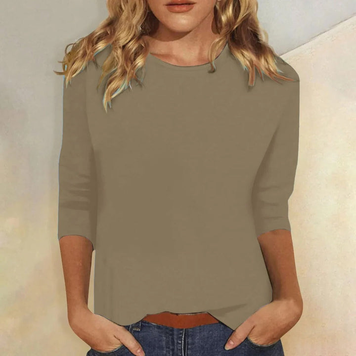 Everyday women's top, relaxed fit, 3/4 sleeves, and a flattering crew neck design.