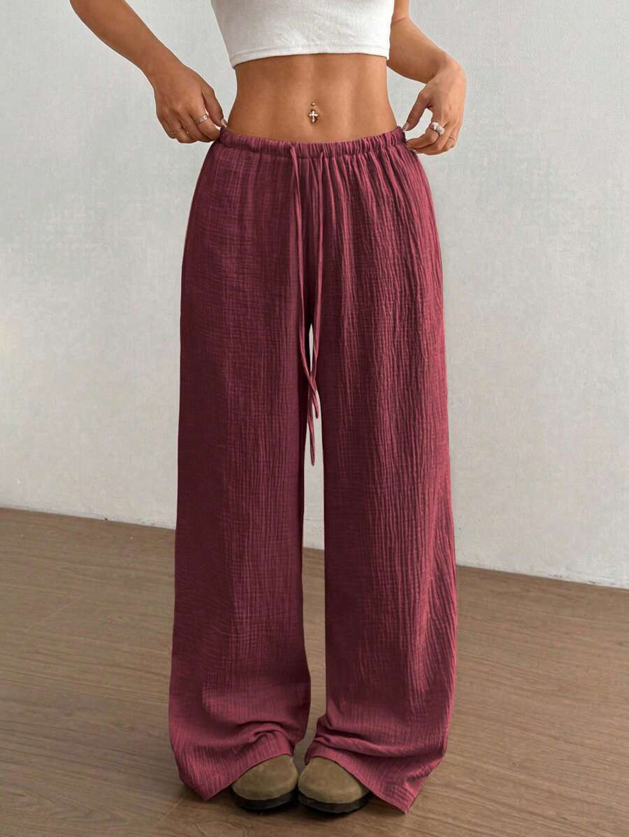 Stylish women's wide leg crinkle pants with drawstring, perfect for summer casual & lounge wear.