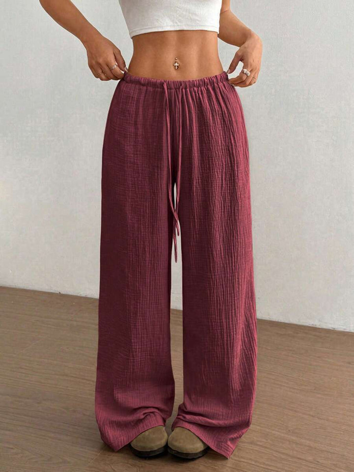 Stylish women's wide leg crinkle pants with drawstring, perfect for summer casual & lounge wear.
