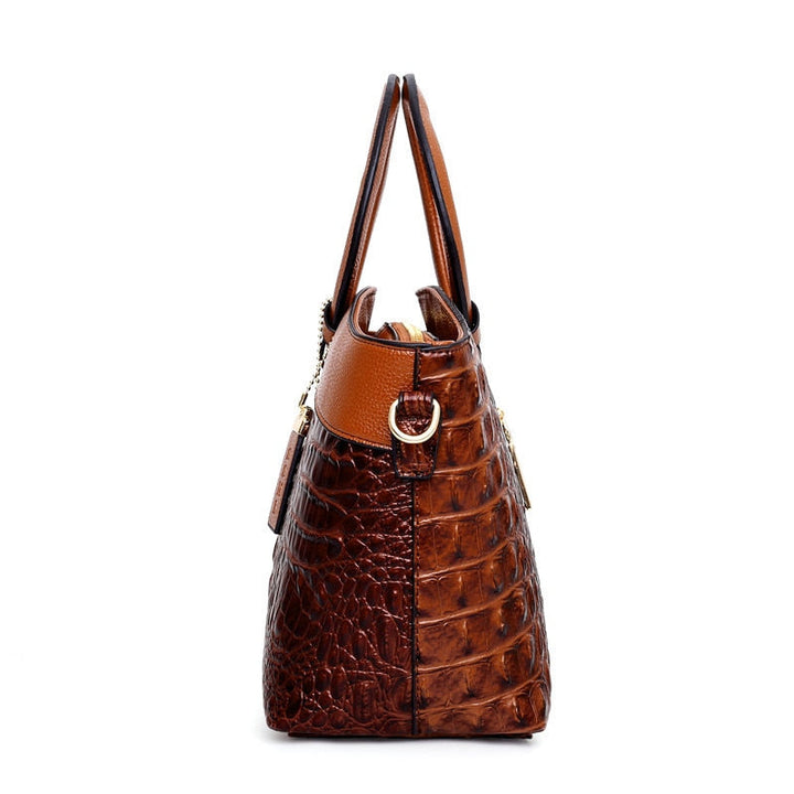 Stylish women's vintage croc embossed handbag, perfect for elegance. Features a round handle.