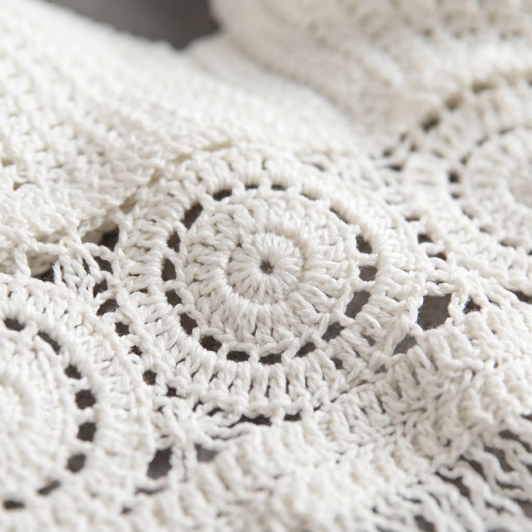 White open stitch crochet halter crop top with beaded fringe for women's summer style.