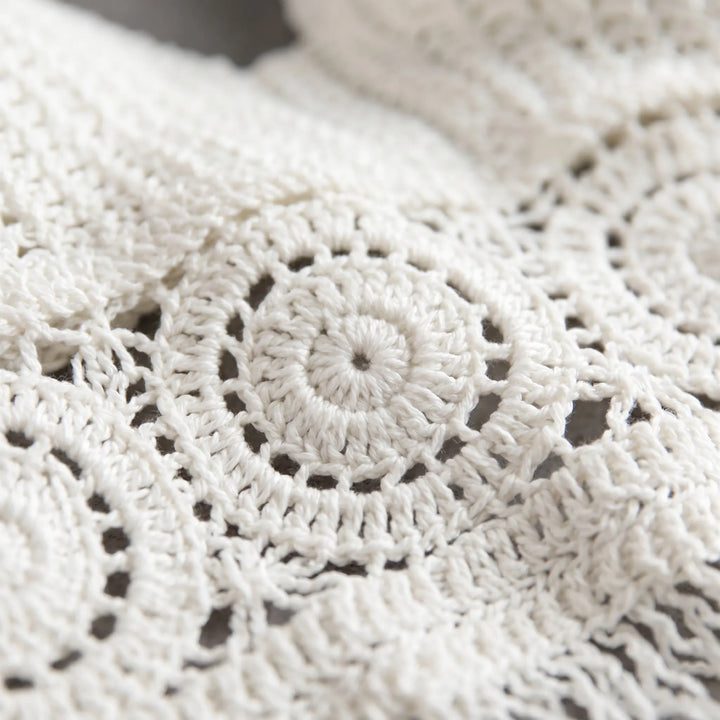 White open stitch crochet halter crop top with beaded fringe for women's summer style.