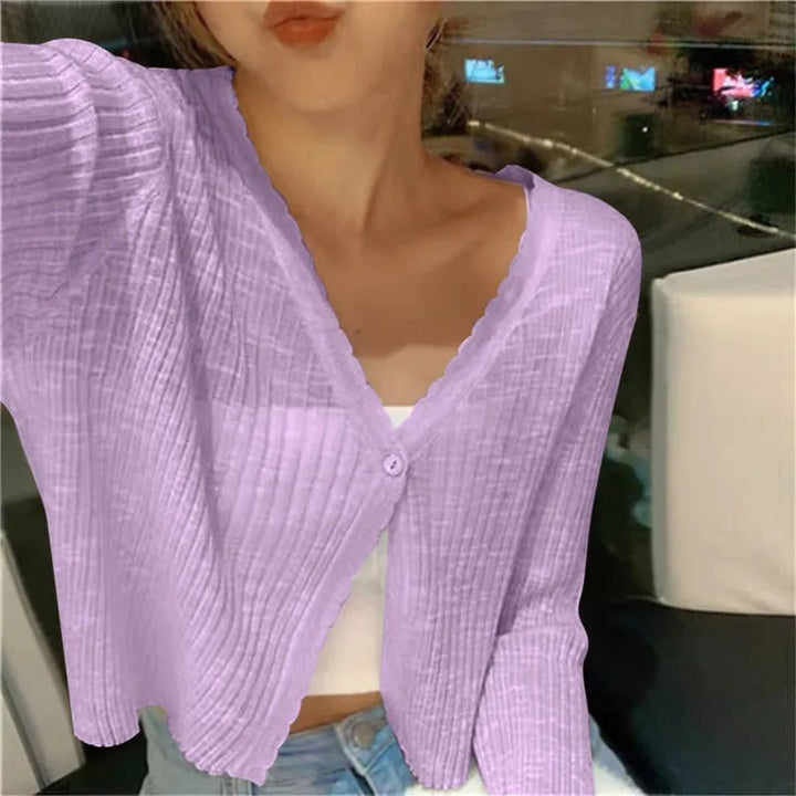 Elegant women's cropped button-front cardigan, a lightweight long-sleeve top perfect for stylish casual summer outfits.