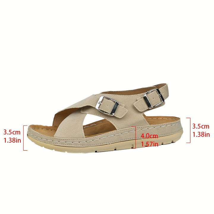 Durable women's platform sandals with cross straps, engineered for comfort and walking.