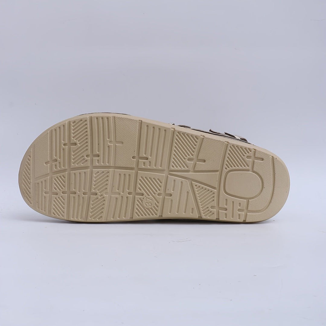 Comfortable women's platform sandals with cross straps, ideal for everyday walking.