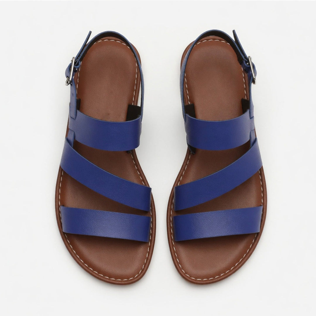 Lightweight women's flat sandals, easy slip-on style with comfortable crossover straps.