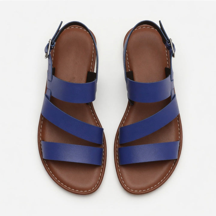Lightweight women's flat sandals, easy slip-on style with comfortable crossover straps.