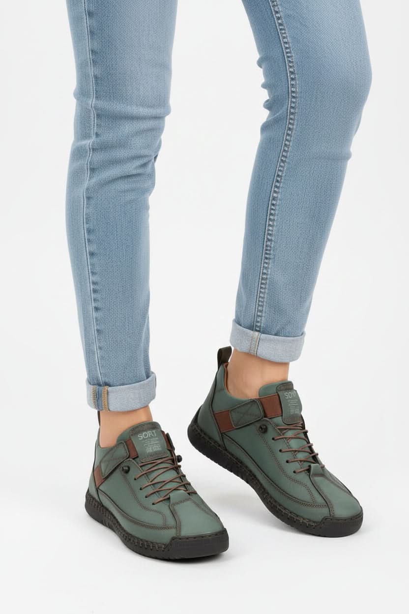 Modern women's wide fit walking shoes with breathable design for all-day comfort.
