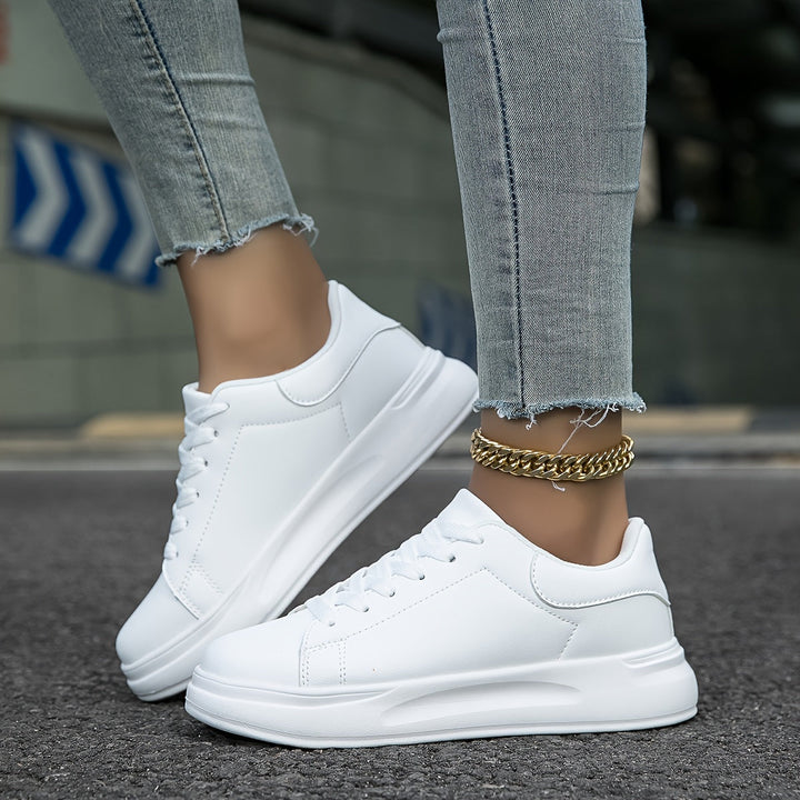 Pair of women's cushioned orthopedic walking sneakers, offering excellent support & comfort for daily walks.
