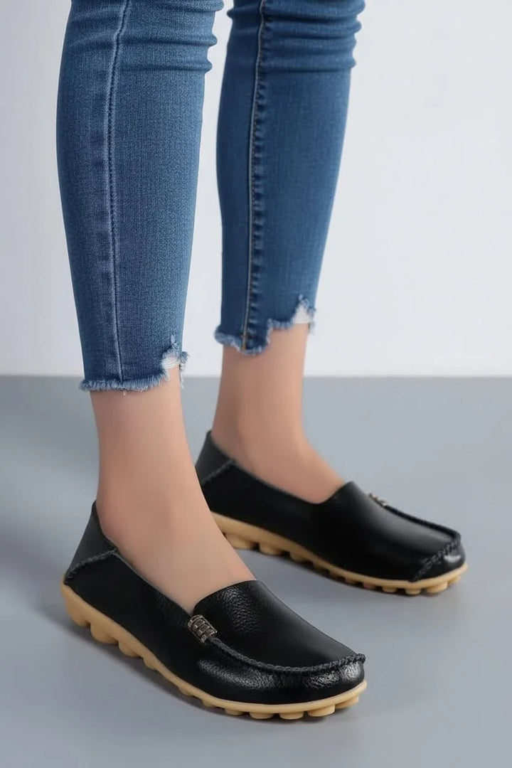 Women's cushioned round toe flat shoes for everyday comfort & style.