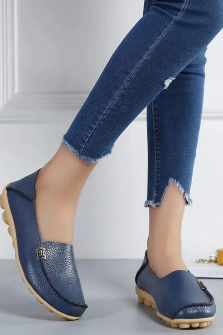 Comfortable women's round toe flats, cushioned for all-day wear & travel.