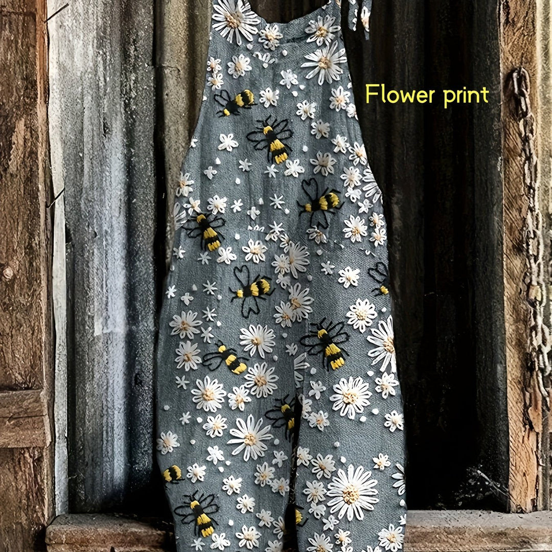 Stylish women's summer fashion jumpsuit: tie shoulder, wide leg, all-over daisy bee print.