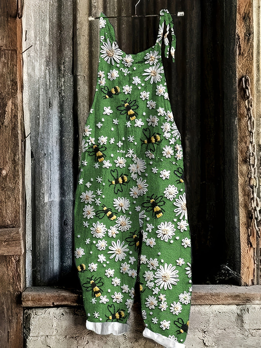 Spring outfit: women's daisy bee print tie shoulder wide leg jumpsuit, perfect for casual wear.
