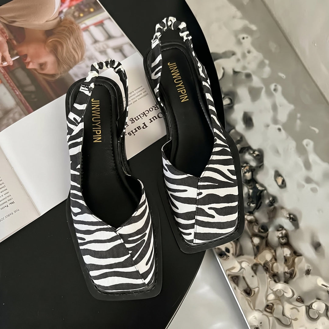 Comfortable women's fashion sandals: square toe, slingback, and a stable low block heel. Great for spring.