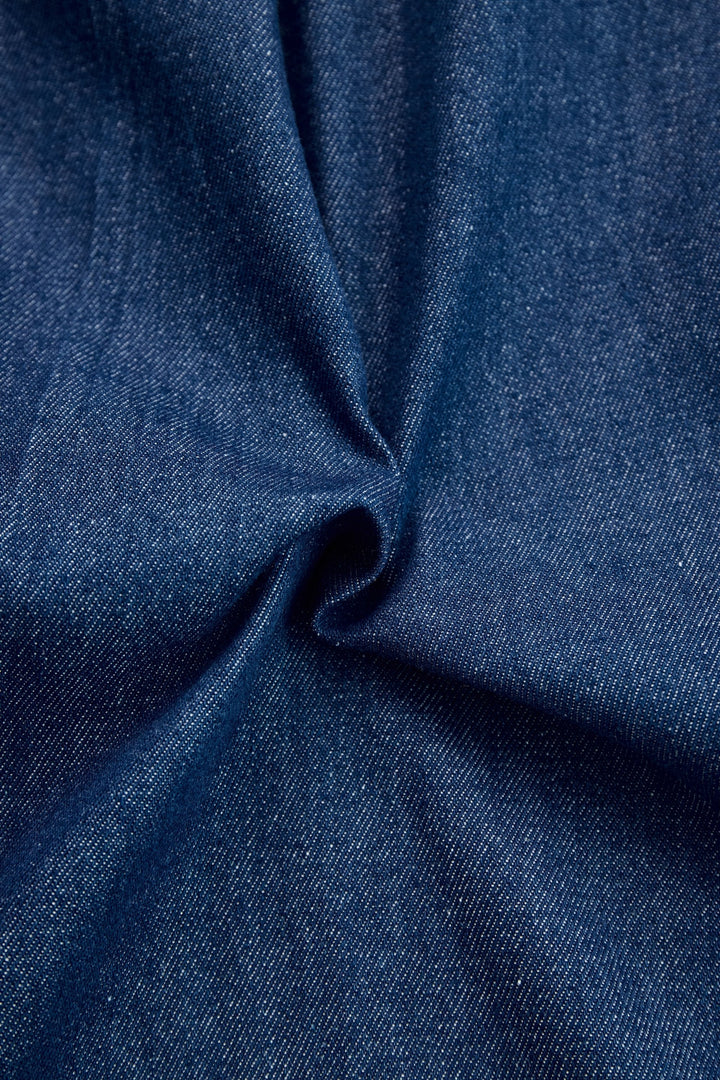 Versatile dark blue wide leg jumpsuit for women. Long sleeve & zip front design offers comfort and effortless chic style.