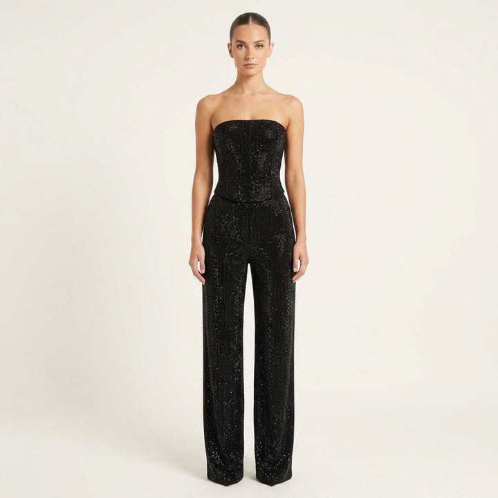 Women's dazzling glitter crop top & high-waist jeans two-piece set for party fashion.