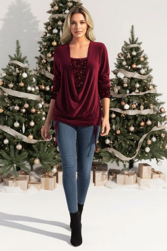 Women's dazzling sequin plunging neck long sleeve top for glamorous evening wear.