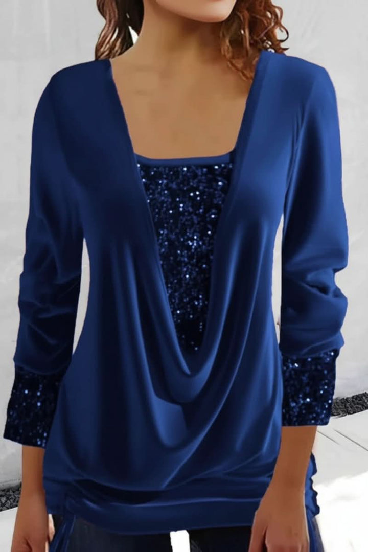 Elegant women's sequin top with a plunging neck & long sleeves, ideal glamorous evening wear fashion.