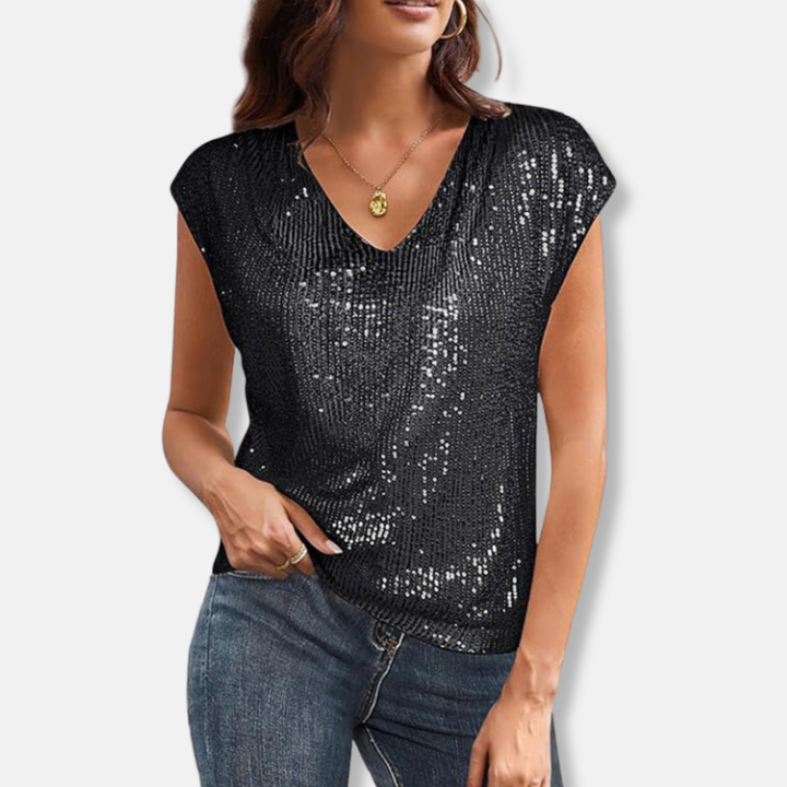 Elegant women's sequin V-neck top with relaxed fit. Perfect shimmering party wear for glamorous evenings.