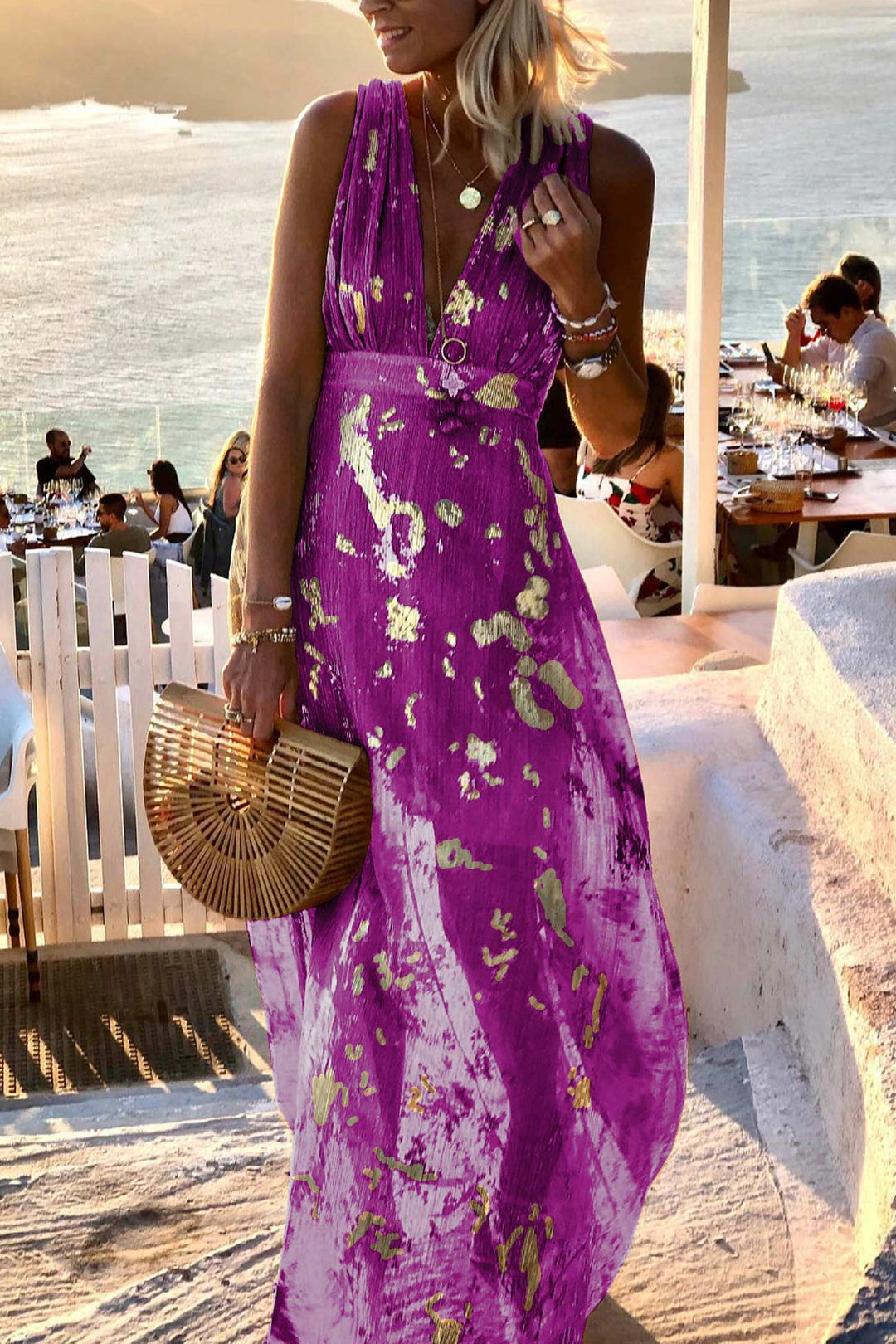 Summer-ready women's tank dress with deep V-neck & golden star print, ideal for casual or party outfits.