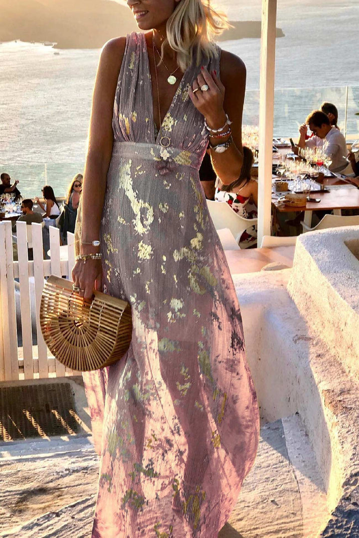Golden star print women's deep V-neck tank dress. Sleeveless design, perfect for warm weather fashion.