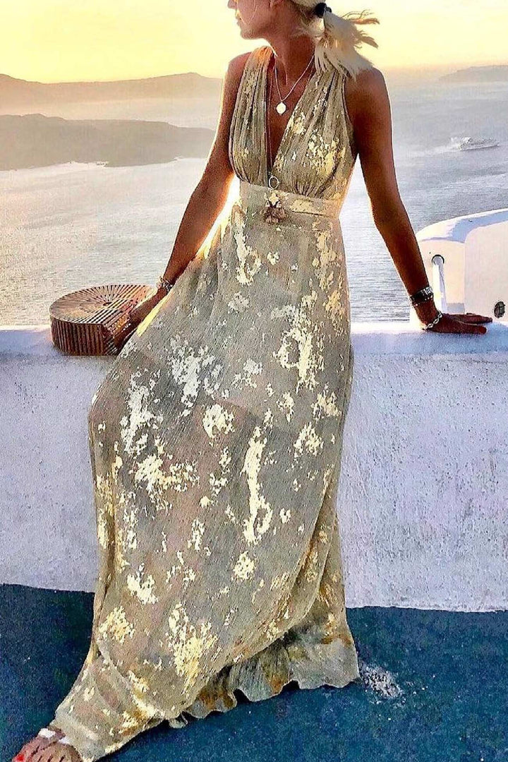 Trendy women's deep V-neck tank dress with a striking golden star print, a must-have for summer fashion.