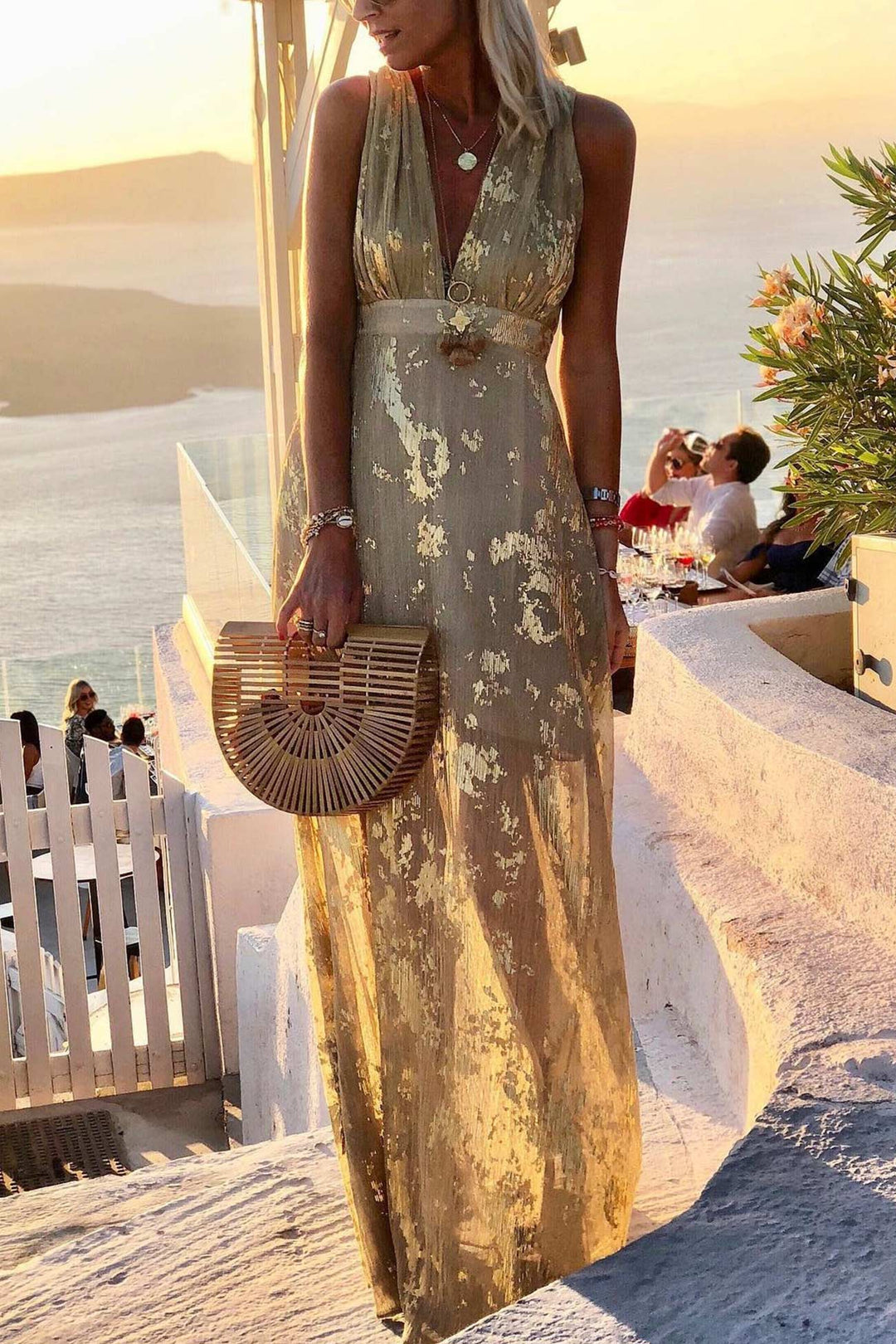 Women's casual chic deep V-neck tank dress, metallic golden star print for summer parties and vacation.