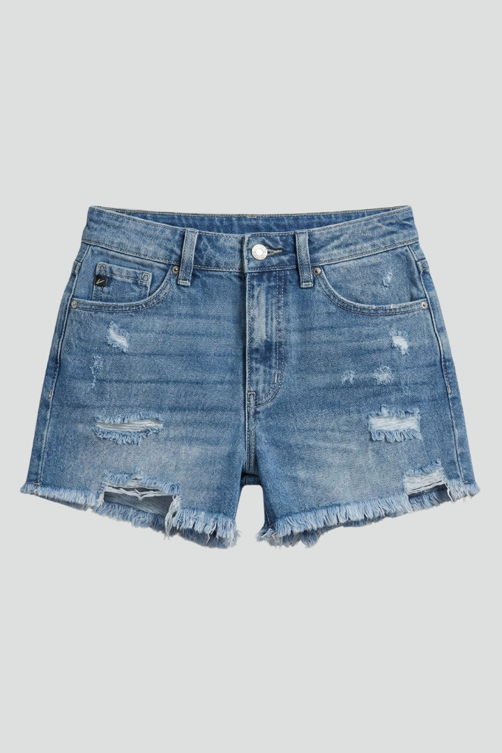 Women's distressed dark blue denim shorts with a trendy frayed hem and mid-rise fit, perfect for summer casual wear.