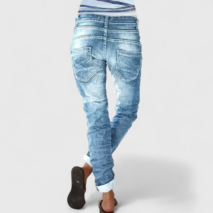 Black distressed wide leg jeans, women's casual fashion pants with vintage ripped details.