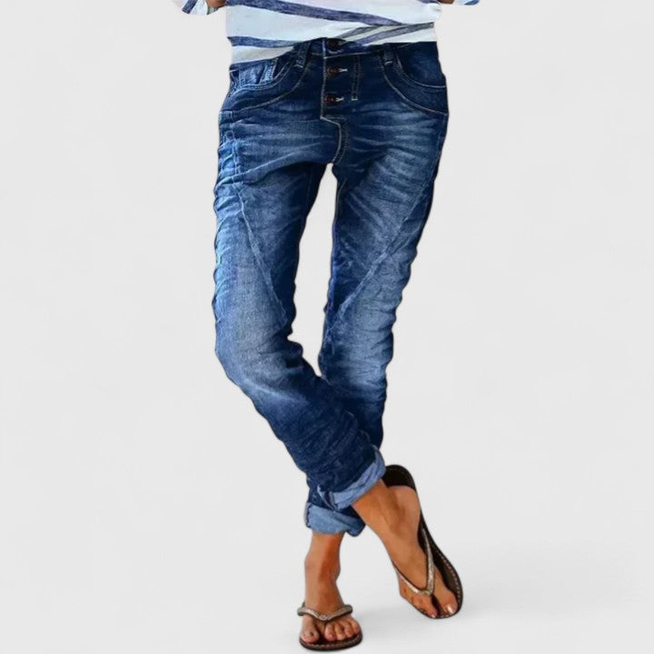 Versatile women's blue distressed wide leg jeans, mid-rise, relaxed fit pants for everyday trendy fashion.