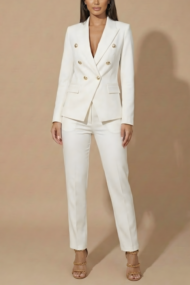 Back view of a women's tailored trouser suit with a double-breasted blazer. Perfect formal wear, elegant design.