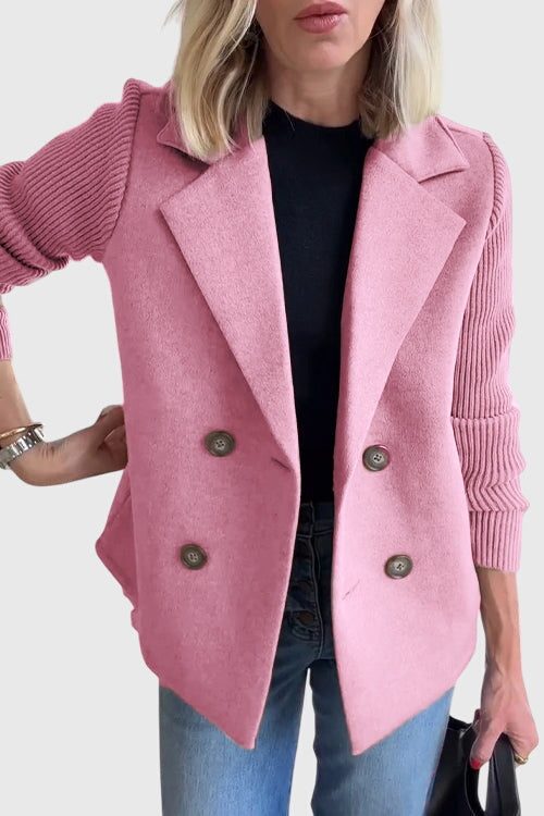 Women's double-breasted blazer with comfy contrast sleeves, perfect for business casual elegance.