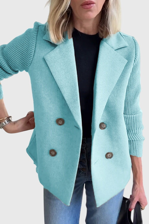 Chic women's tailored jacket featuring a double-breasted design & stylish contrast sleeves.