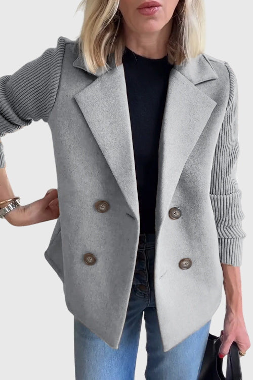 Women's double-breasted blazer, a chic tailored jacket with comfy contrast sleeves for versatility.