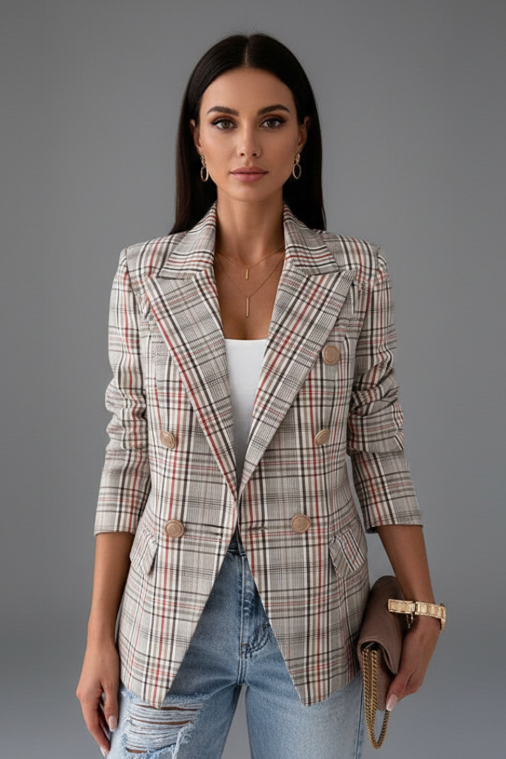 Elegant ladies' double-breasted blazer. Classic plaid pattern, suitable for professional office attire or smart casual style.