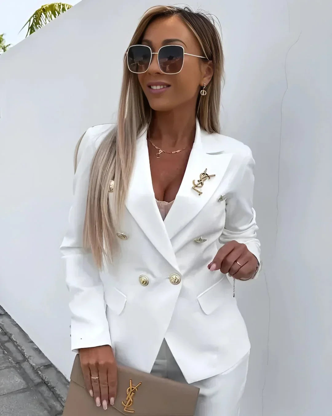 Woman in a stylish double-breasted tailored suit, exuding professional confidence for business and office.