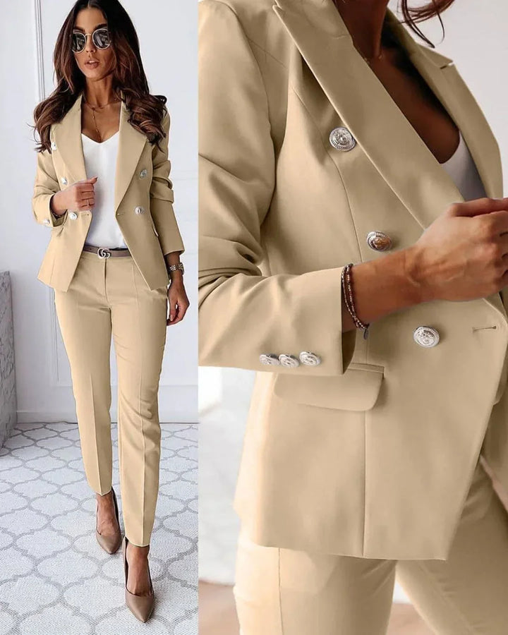 Chic women's double-breasted tailored blazer, part of a stylish suit set for work and professional attire.