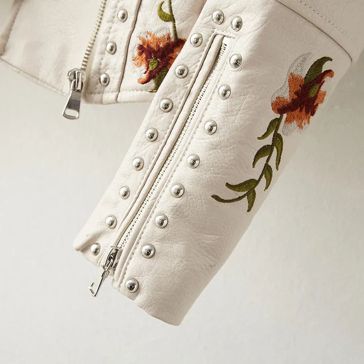 Floral embroidered & studded black women's jacket. Perfect edgy outerwear for a bold fashion statement.