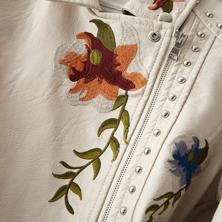 Trendy women's jacket: black, edgy, with studded accents & beautiful floral embroidery. Biker chic.