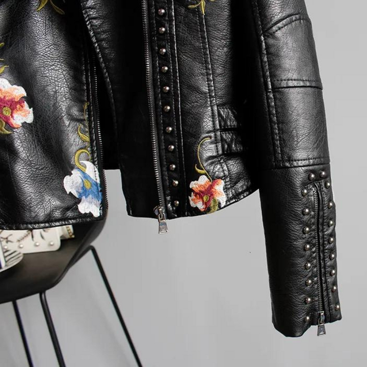 Unique women's embroidered & studded black jacket. Outerwear with intricate floral and edgy studs.