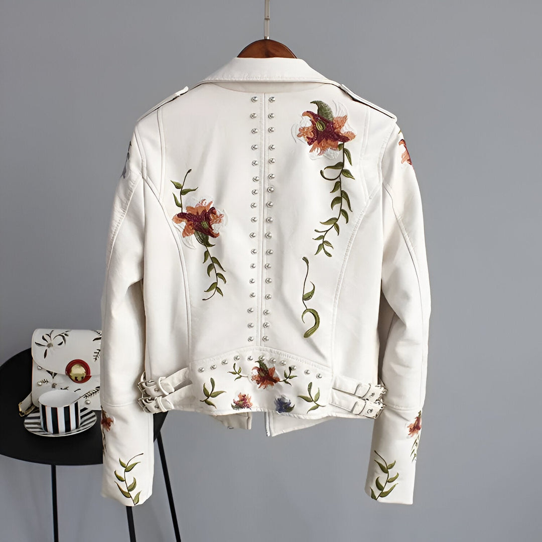 Stylish women's black jacket featuring edgy studs & delicate floral embroidery for a unique look.