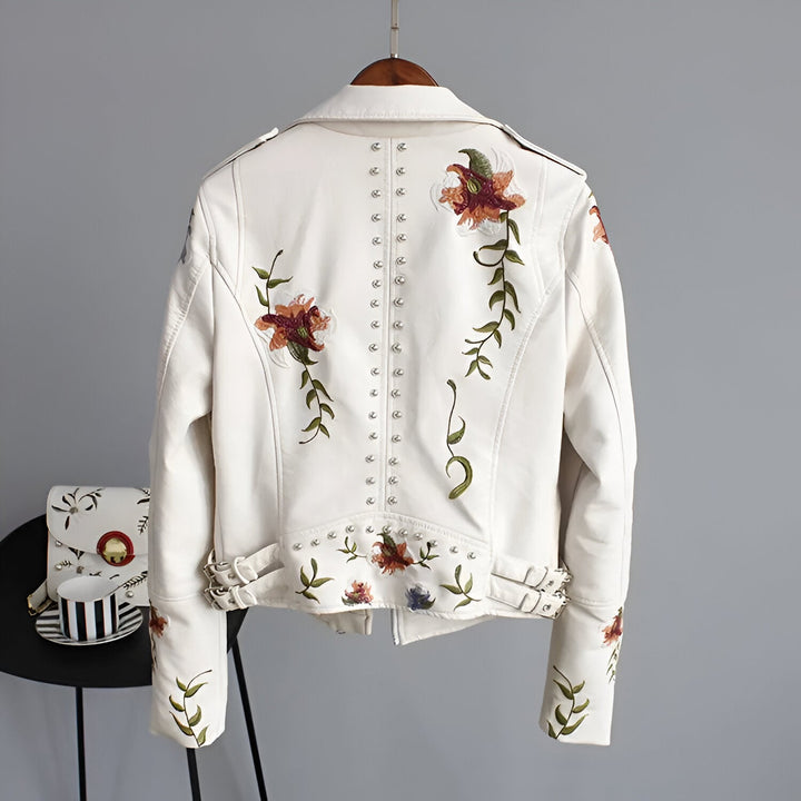Stylish women's black jacket featuring edgy studs & delicate floral embroidery for a unique look.