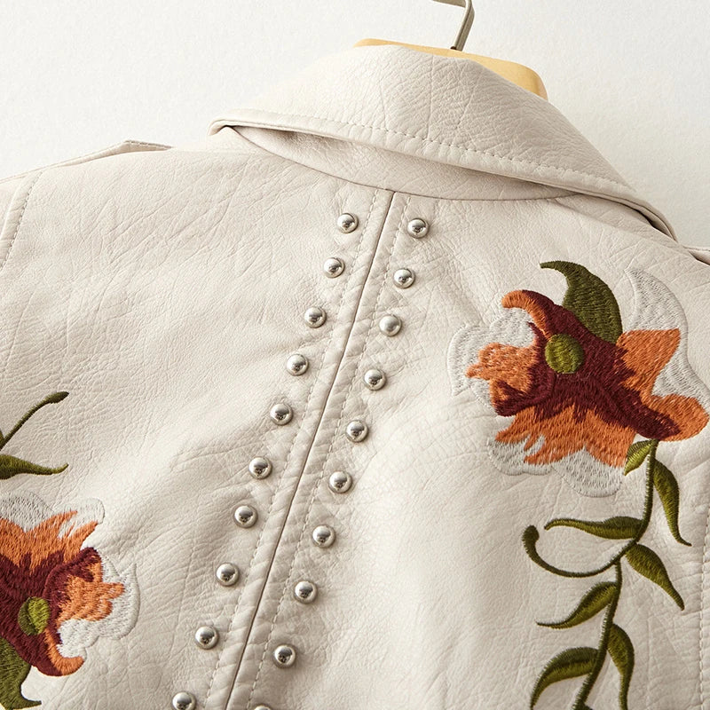 Women's embroidered studded jacket, black, offering a chic edgy biker style statement.