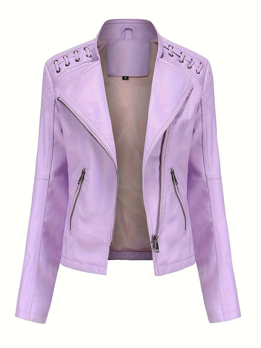 Close-up of studded shoulders on a women's edgy black moto jacket, highlighting biker details.