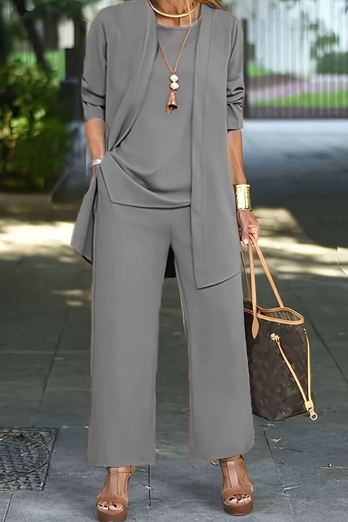 Model enjoying a relaxed moment in the comfy women's summer 3-piece loungewear set.