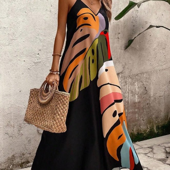 Women's effortless abstract tropical print maxi sundress with V-neck, spaghetti straps for summer beachwear & vacation.