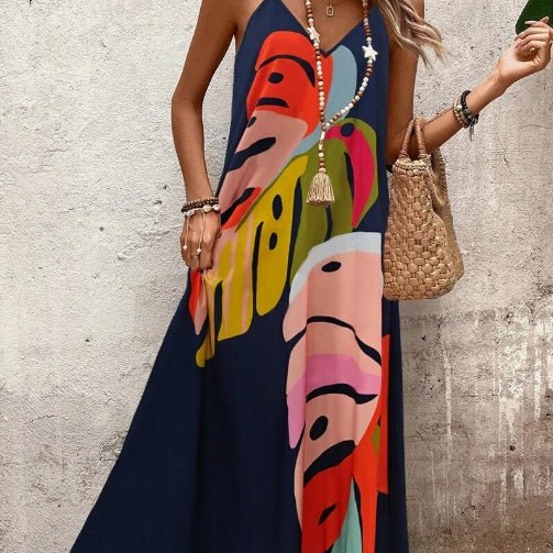 Flowing women's abstract print maxi sundress, perfect for summer fashion, beach or vacation. Sleeveless, casual elegance.
